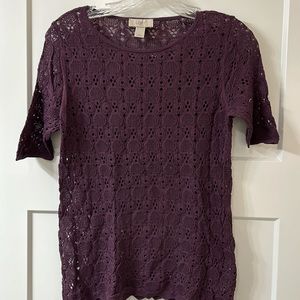 Women’s crochet look top.